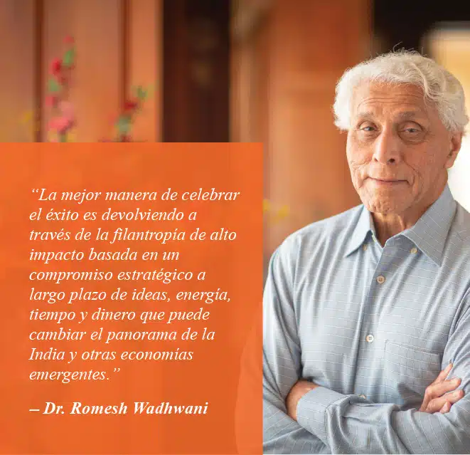Hombre de negocios y filántropo posando pensativamente en el interior de un edificio, con una cita inspiradora sobre la filantropía que destaca su compromiso