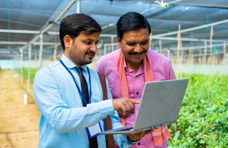Indian,Agro,Expert,Or,Banking,Officer,Showing,Increase,Plant,Growth